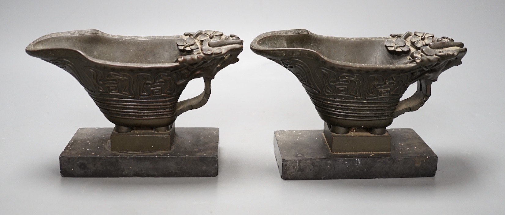 A pair of 19th century French bronze models of Chinese libation cups - 10cm tall
